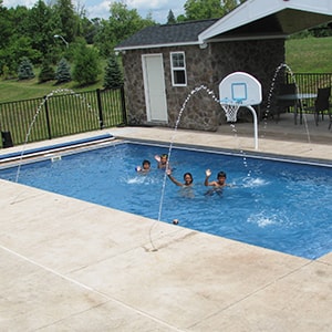 Rectangular Fiberglass Pool with Automatic Cover and Stamped Concrete